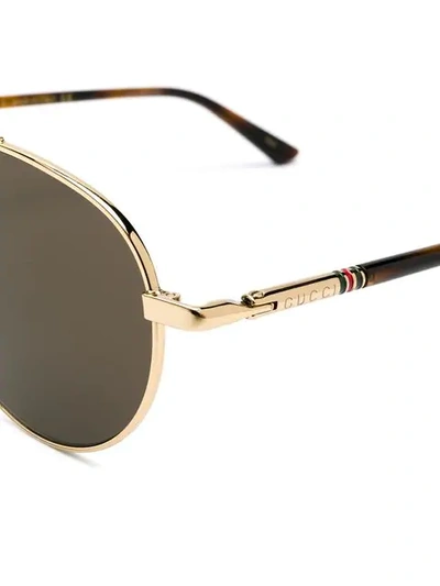 Shop Gucci Aviator Sunglasses In 003
