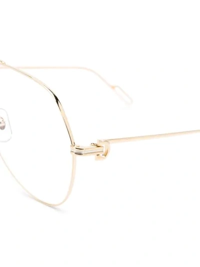 Shop Cartier Pilot-frame Glasses In Gold