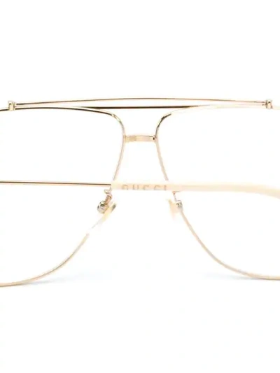 Shop Gucci Eyewear Aviator Glasses - Gold
