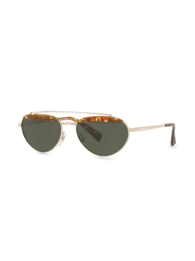 Shop Alain Mikli Small Frame Round Sunglasses In Gold