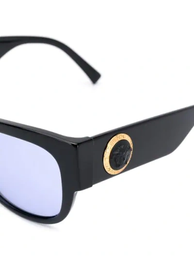 Shop Versace Round Sunglasses In Black