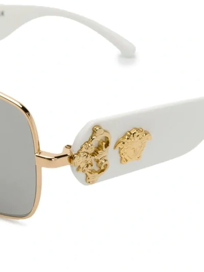 Shop Versace Leather Logo Detail Sunglasses In White
