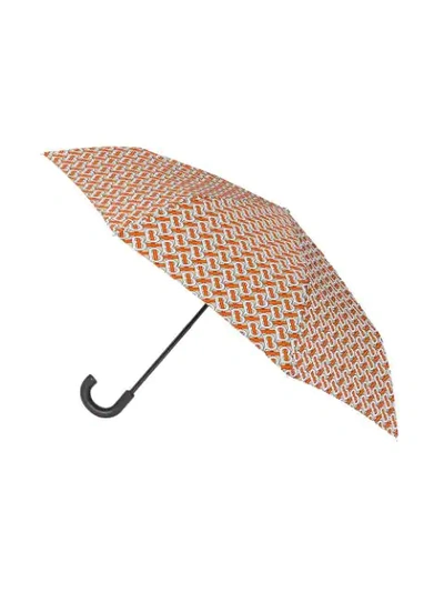 Shop Burberry Monogram Print Folding Umbrella In Orange ,white