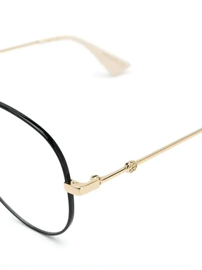 Shop Gucci Aviator Framed Glasses In Gold