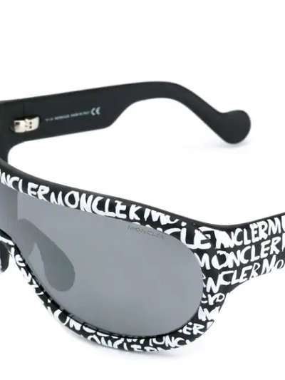 Shop Moncler Eyewear Sports Shield Sunglasses - Black
