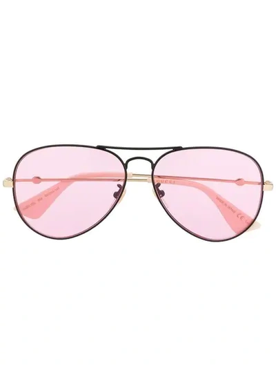 Shop Gucci Aviator Sunglasses In Gold