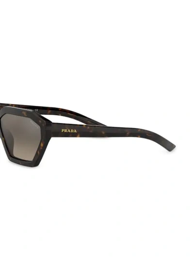 Shop Prada Disguise Geometric Sunglasses In Brown