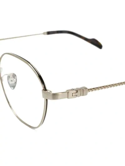 Shop Yohji Yamamoto Round Glasses - Metallic