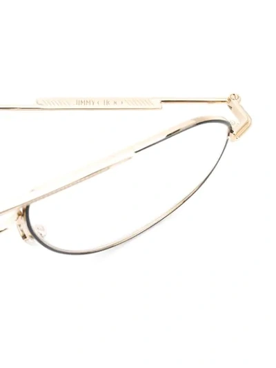 Shop Jimmy Choo Aviator Frame Glasses In Gold