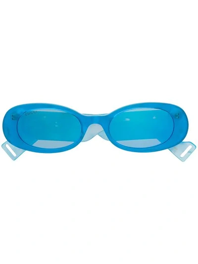 Shop Gucci Oval Frame Sunglasses In Blue