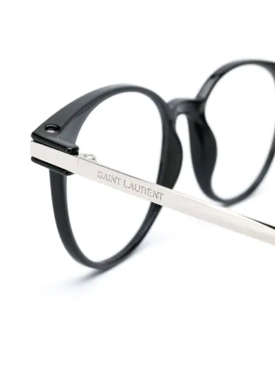 Shop Saint Laurent Round Glasses In Black