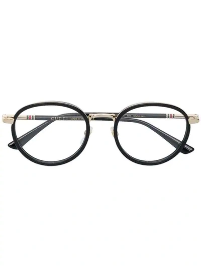 Shop Gucci Round Glasses In Black