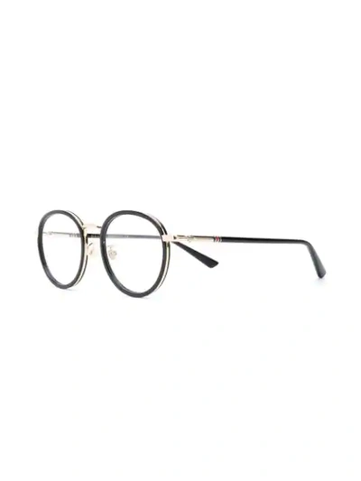 Shop Gucci Round Glasses In Black