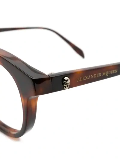 Shop Alexander Mcqueen Round Glasses In Brown