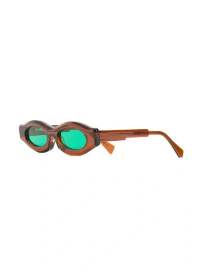 Shop Kuboraum Oval Frame Sunglasses In Brown