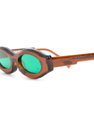 Shop Kuboraum Oval Frame Sunglasses In Brown