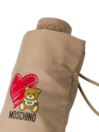Shop Moschino Heart Pattern Umbrella In Brown