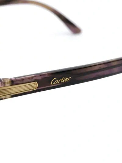 Shop Cartier Round Glasses - Brown