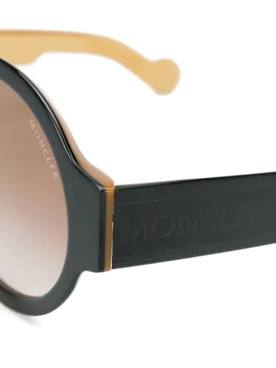 Shop Moncler Round Shape Sunglasses In Black
