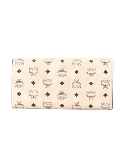 Shop Mcm Logo Print Flap Wallet In Pink