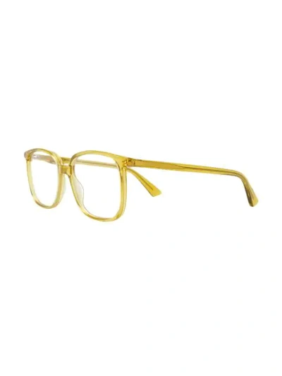 Shop Gucci Eyewear Square Frame Glasses - Yellow