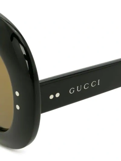 Shop Gucci Oval-frame Sunglasses In Black