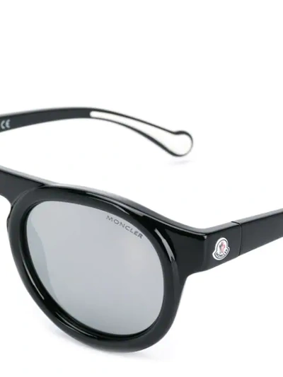 Shop Moncler Round Sunglasses In Black