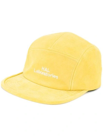 Shop Undercover Hat In Yellow