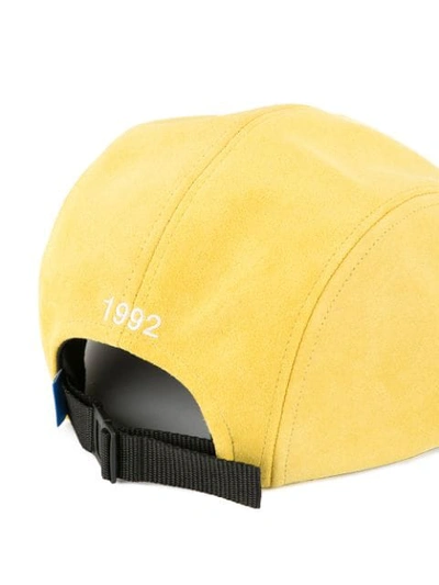 Shop Undercover Hat In Yellow