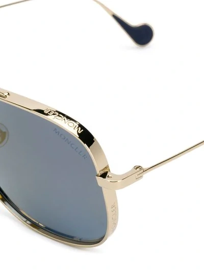 Shop Moncler Mountaineering Sunglasses In 30d Gold/blue