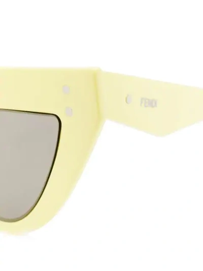 Shop Fendi Cat Eye Sunglasses In Yellow