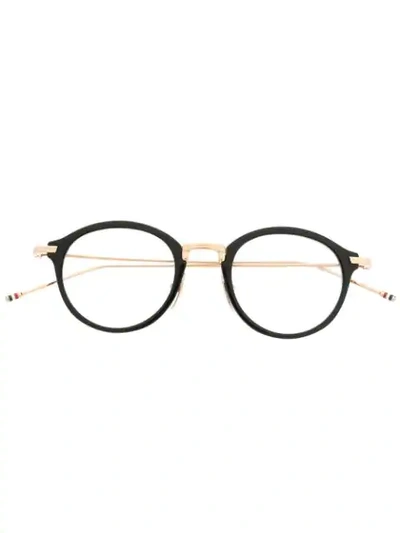 Shop Thom Browne Round Glasses In Black
