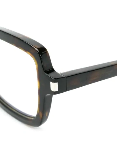 Shop Saint Laurent Rectangular Frame Glasses In Brown
