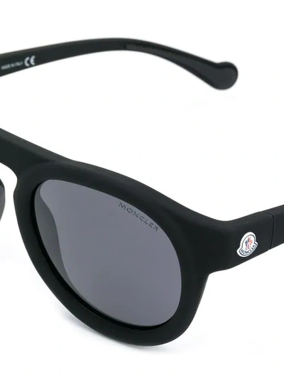 Shop Moncler Round Sunglasses In Black