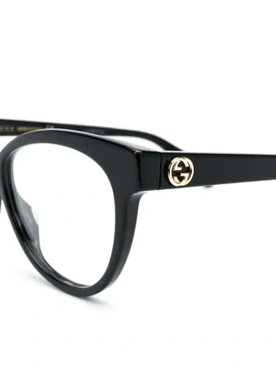 Shop Gucci Eyewear Cat-eye Frame Glasses - Black