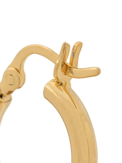 Shop Northskull Crucifix Hoop Earring In Gold