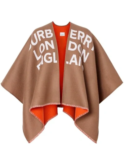 Shop Burberry Logo Detail Wool Jacquard Cape In Brown