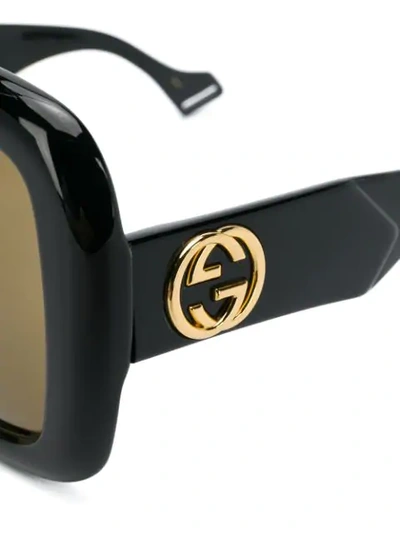 Shop Gucci Oversized Sunglasses In 001 Black Black Brown