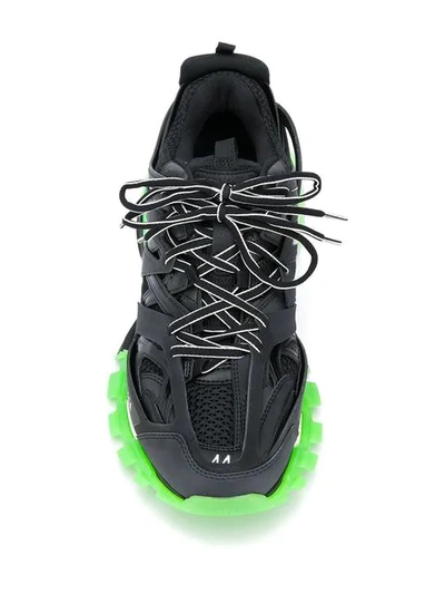 Shop Balenciaga M Track Glow-in-the-dark Sneakers In Black