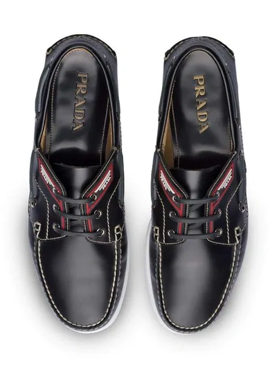 Shop Prada Brushed Leather Boat Shoes In Black