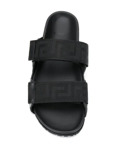 Shop Versace Contrast Logo Sandals In Black