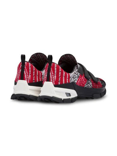 Shop Prada Crossection Knit Sneakers In F022c Black/scarlet Red