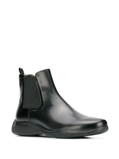 Shop Prada Space Chelsea Boots In Black