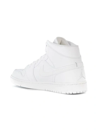 Shop Nike Air Jordan 1 Mid Sneakers In 104