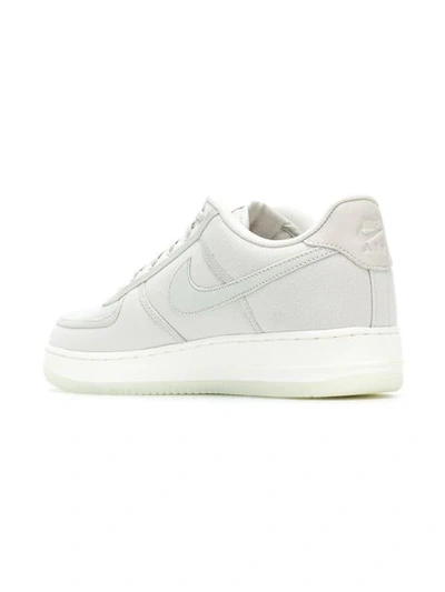 Shop Nike Air Force 1 Sneakers In White