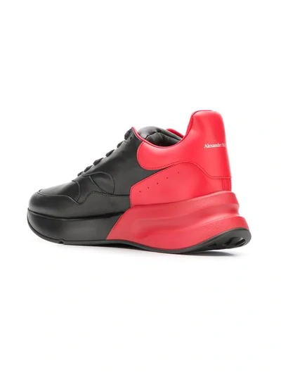 Shop Alexander Mcqueen Oversized Runner Sneakers In 1037 Black/red