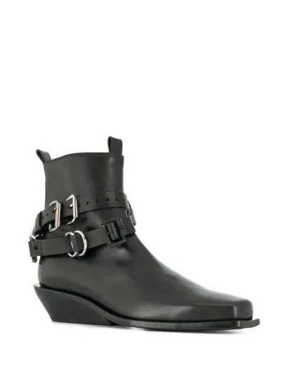 Shop Ann Demeulemeester Buckle Strap Ankle Boots In Black