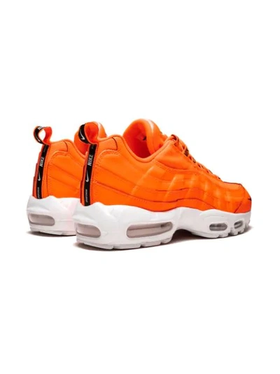 Shop Nike Air Max 95 Premium Sneakers In Orange