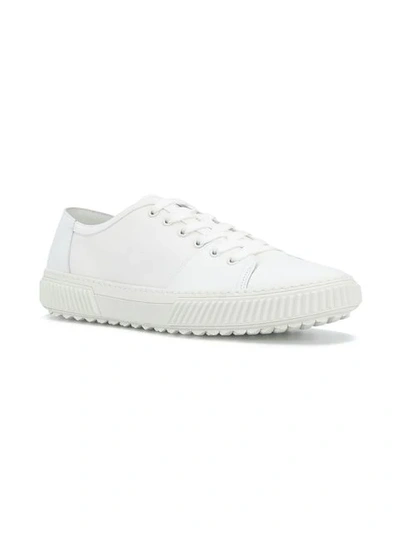 Shop Prada Low Top Lace-up Sneakers In White