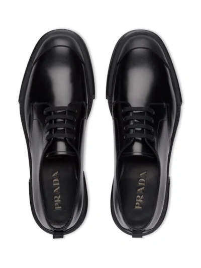Shop Prada Thick Sole Derby Shoes In Black